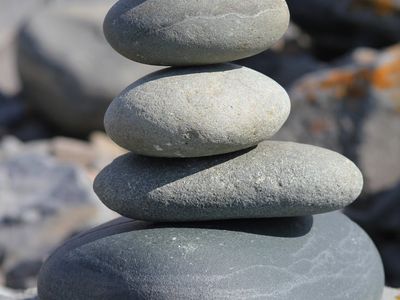 Smooth stones stacked in a zen balance.