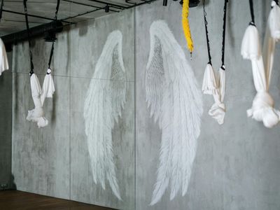 Sunlight streaming into a minimalist yoga studio space.